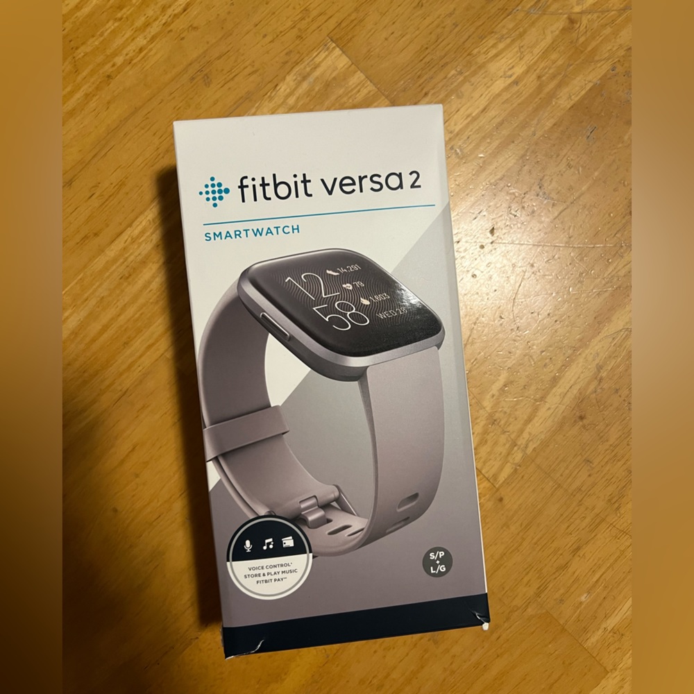 Fitbit Versa 2 includes charger, bumper, 2 watchbands.